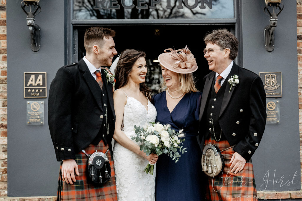 Bride and Groom with Family